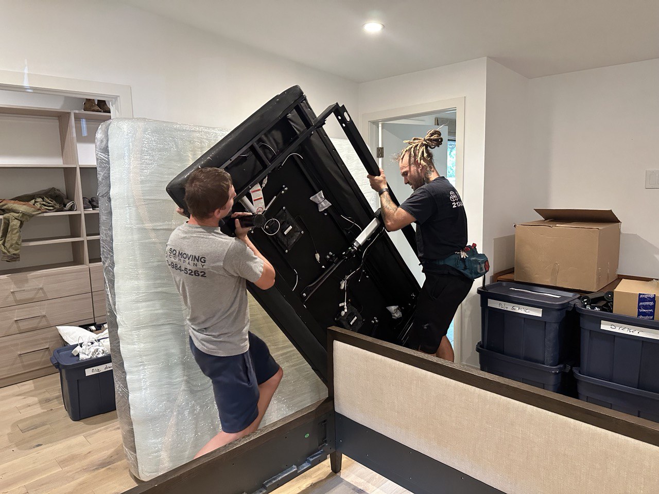 Professional and affordable Westwood movers assembling the electrical bed