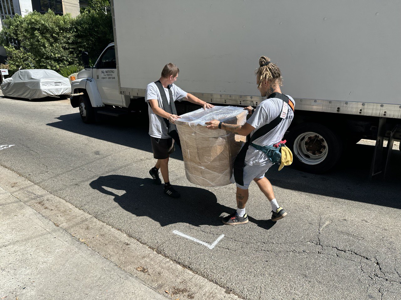 Our affordable movers in Studio City are carrying dinning table base