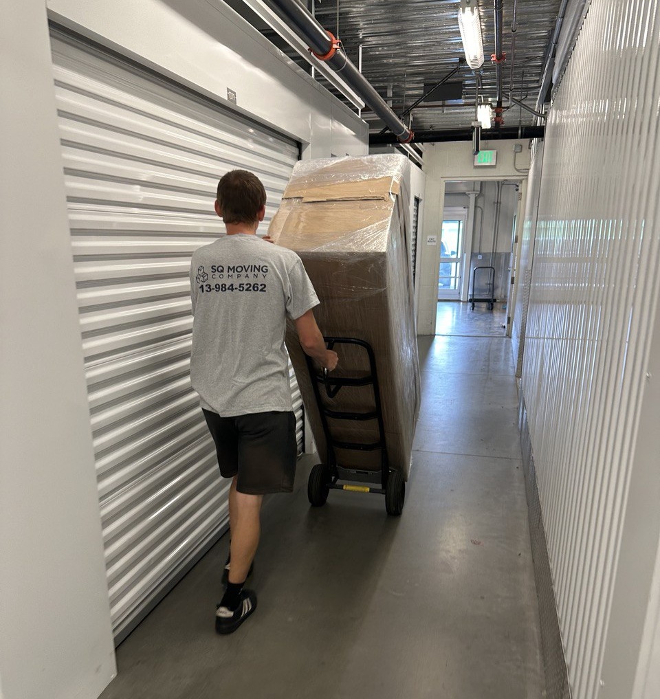 Reliable Sherman Oaks Movers Working in the Storage Facility 