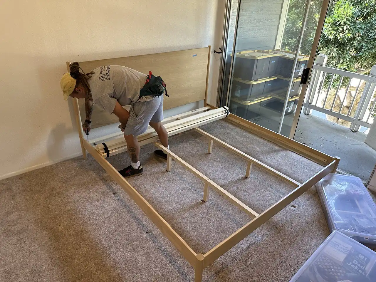 Bed frame disassembling by professional Encino movers