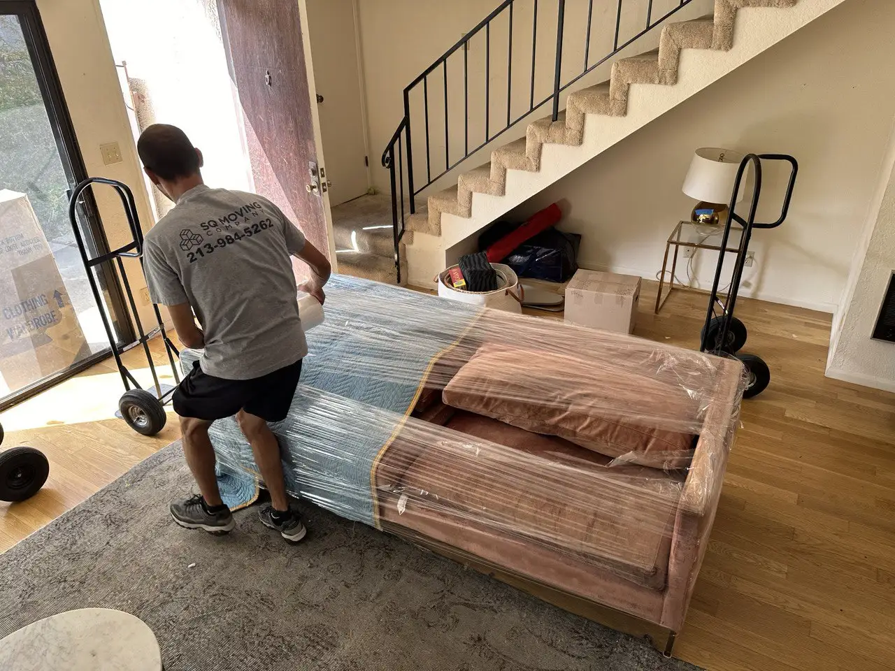 Movers in Encino packing the couch