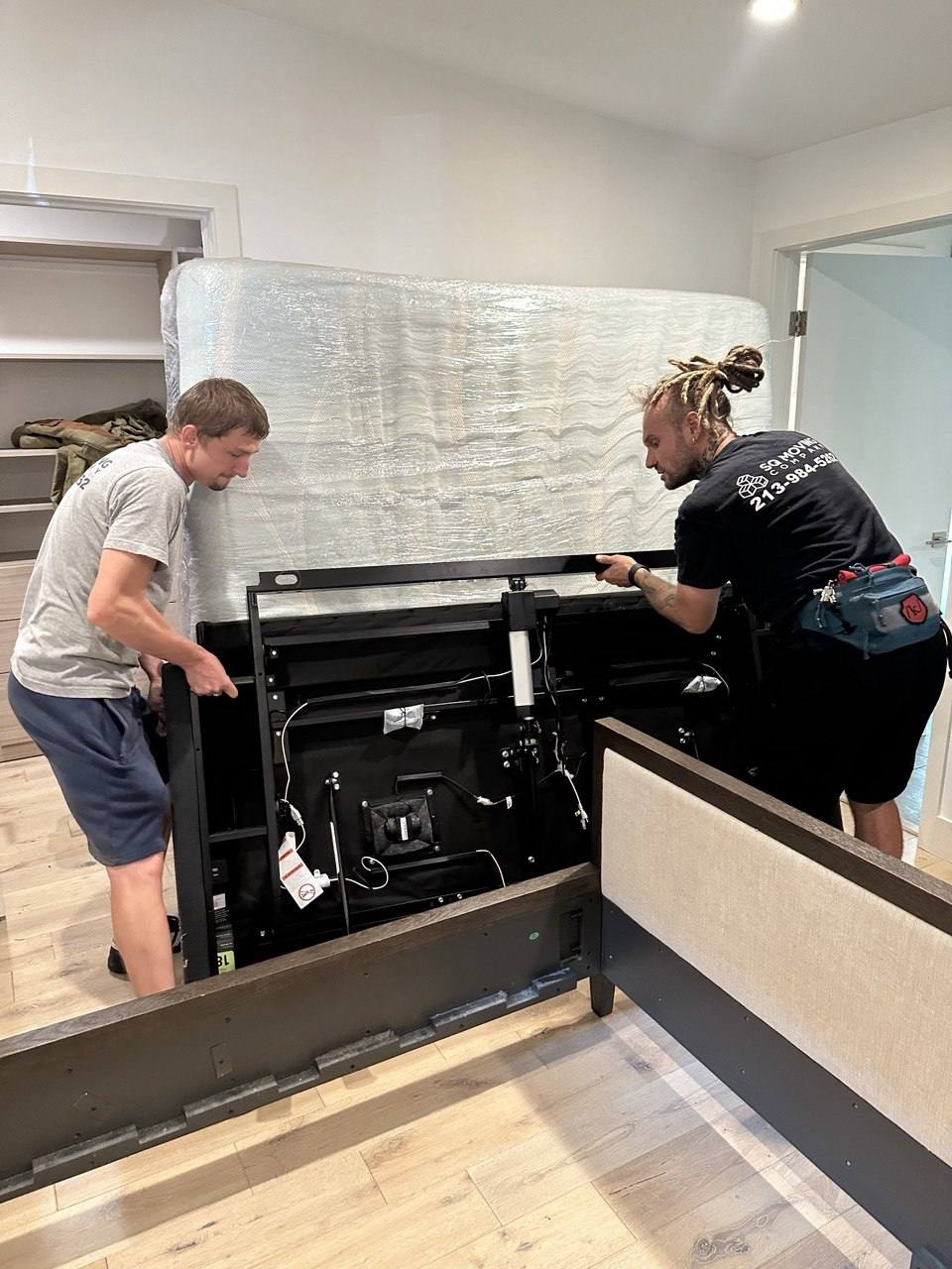 SQ Moving Company – professional Los Angeles movers installing an electric bed as part of full-service local moving