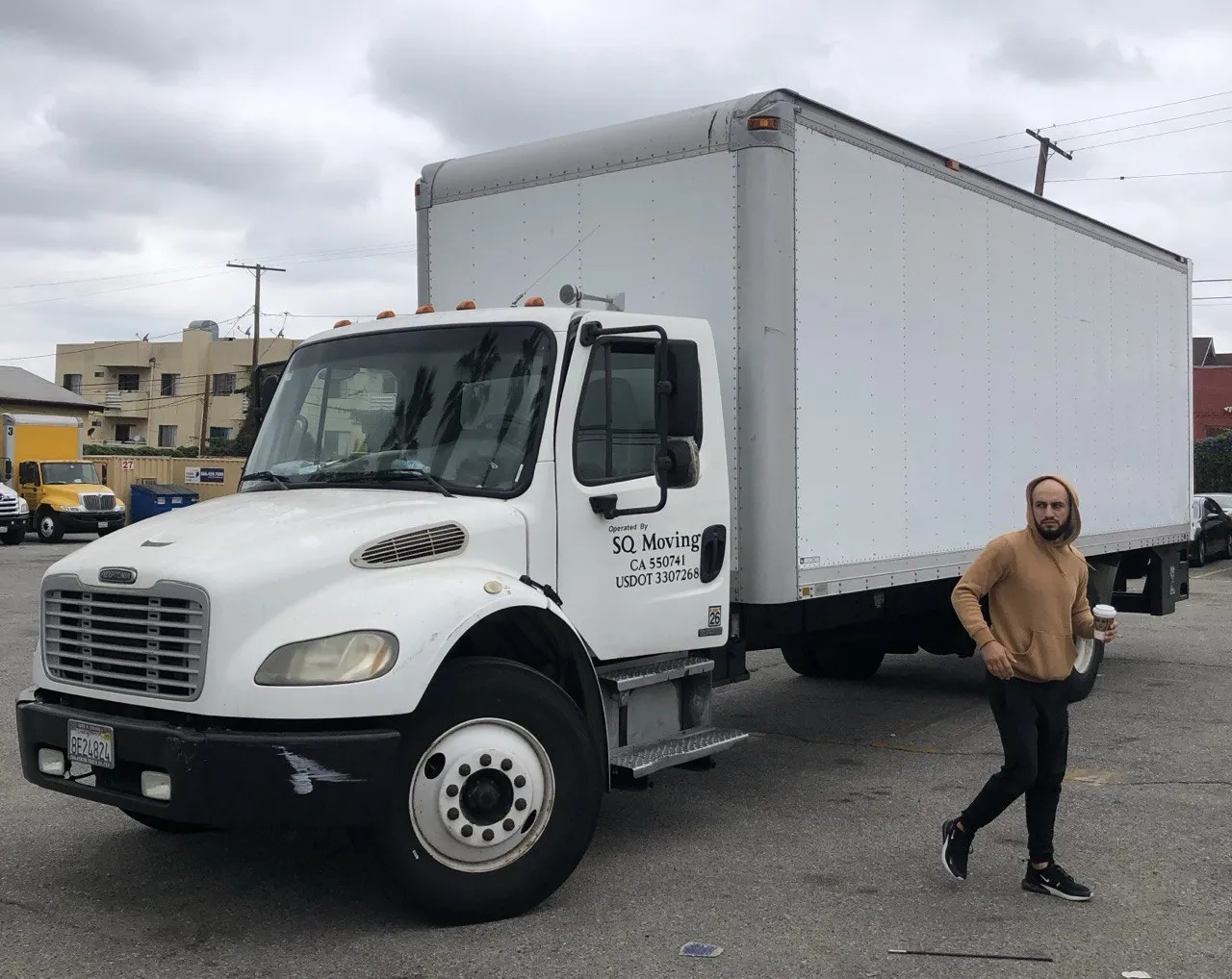 Downtown Los Angeles movers with a large SQ Moving Company truck getting ready for a move in DTLA