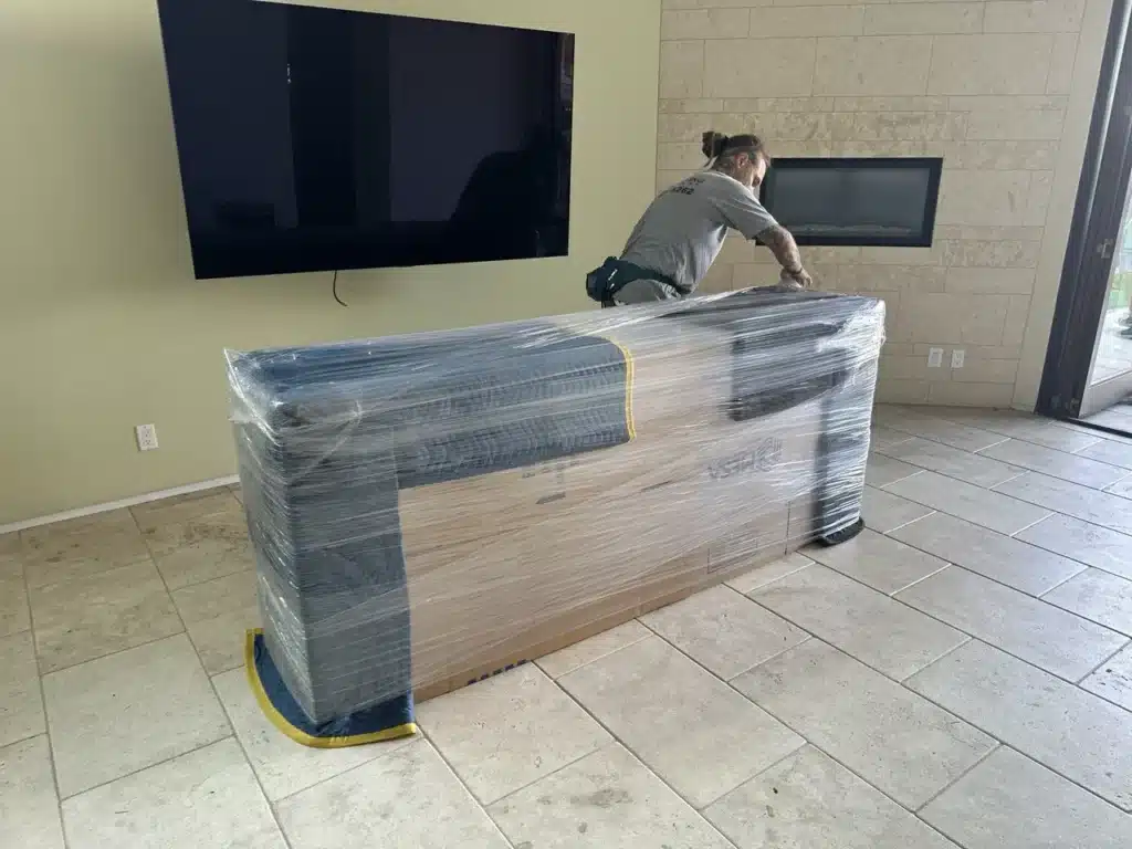 How to Prepare Furniture for Moving in LA: Step-by-Step Guide 3 How to pack square furniture, packing of large credenza with moving blankets and cardboard